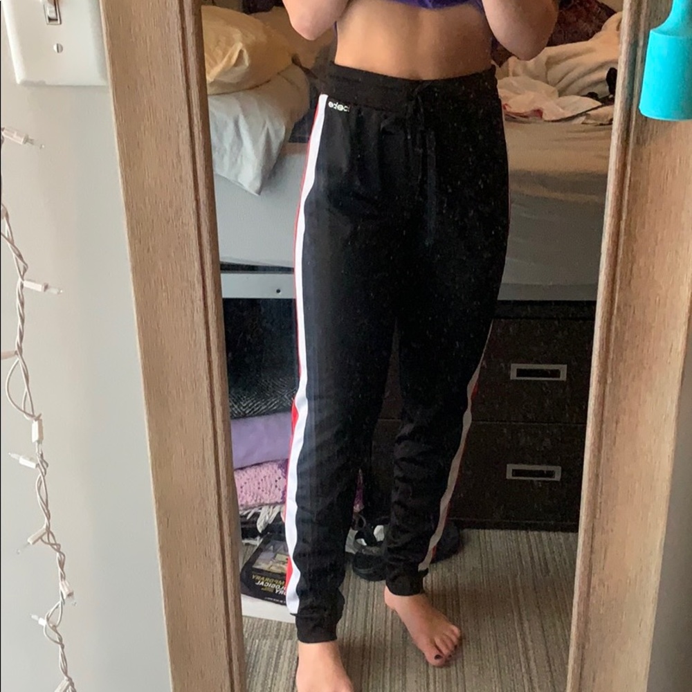 Bebe red white and black sweat pants